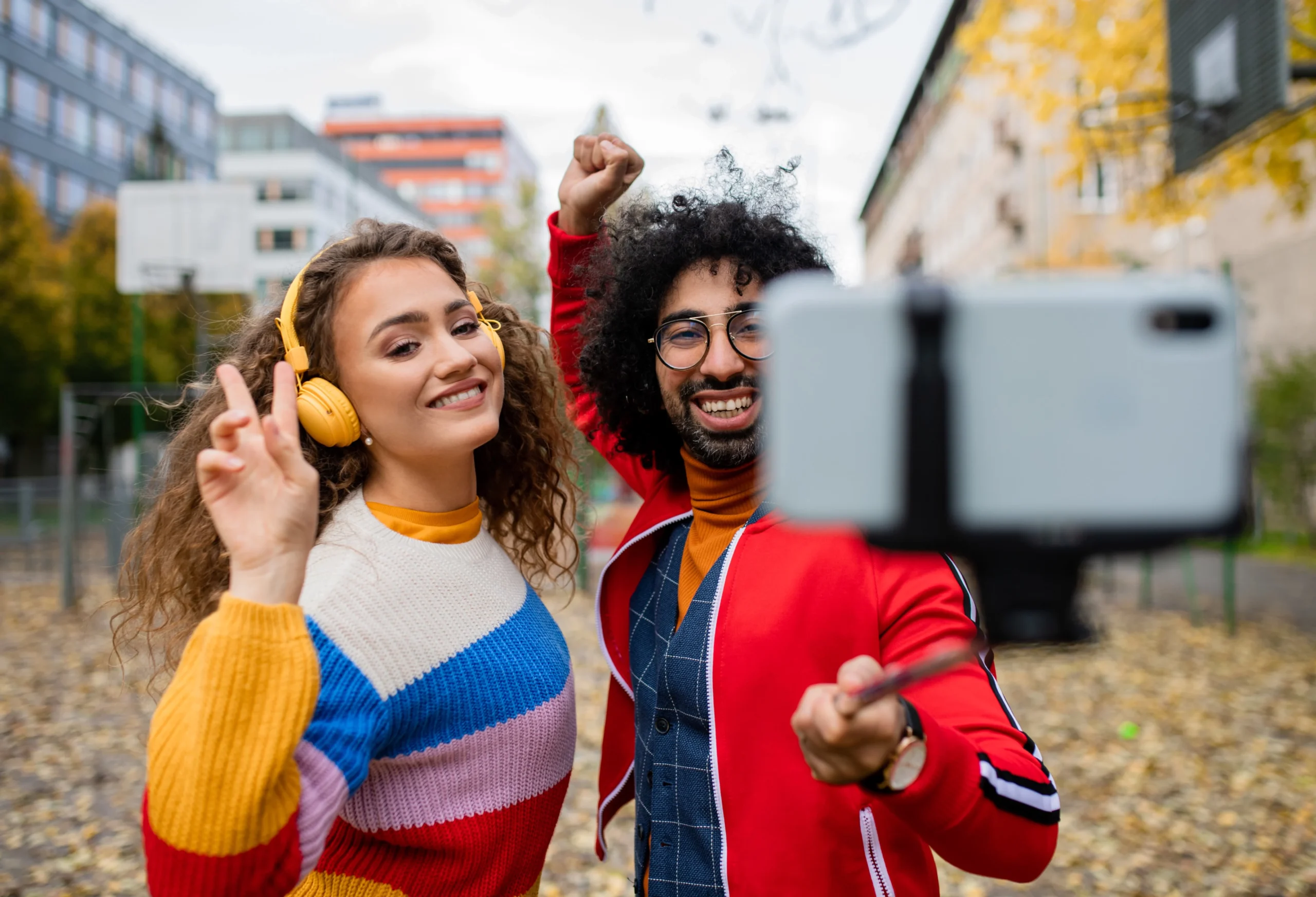Young couple recording a fun social media video together