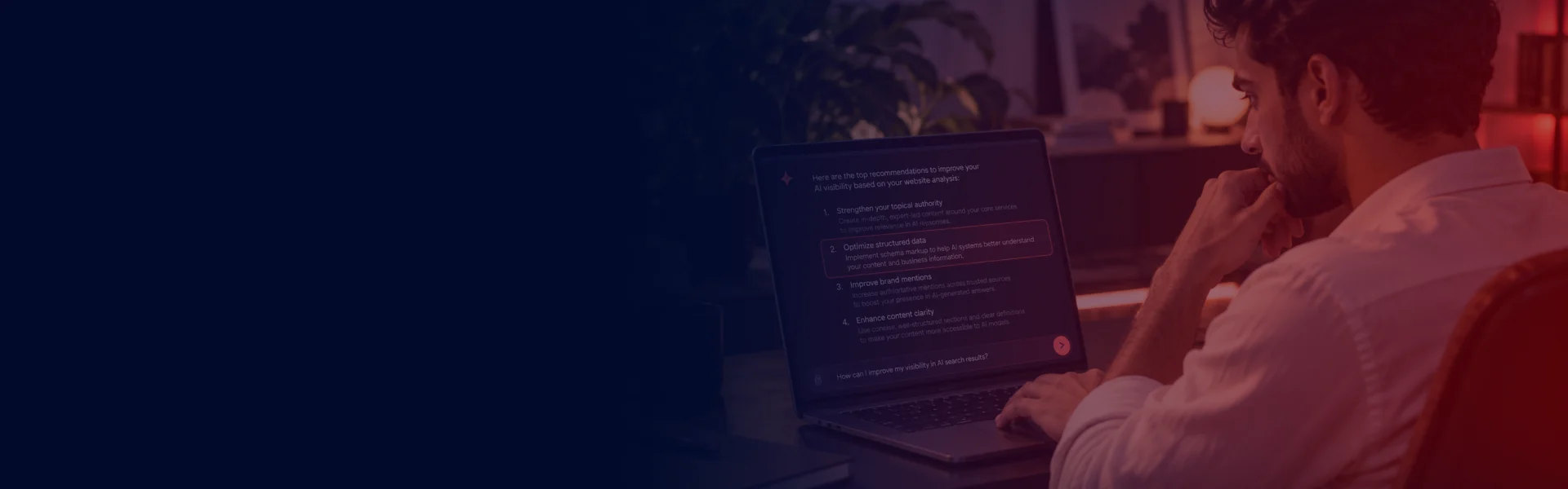 Marketing professional analyzing AI search visibility recommendations and AEO and GEO optimization strategies on a laptop.